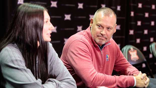 Oct 18, 2022; Kansas City, Missouri, US; Kansas coach Brandon Schneider being interviewed during the womens Big 12 Basketball Tipoff event at the T-Mobile Center. Mandatory Credit: William Purnell-USA TODAY Sports